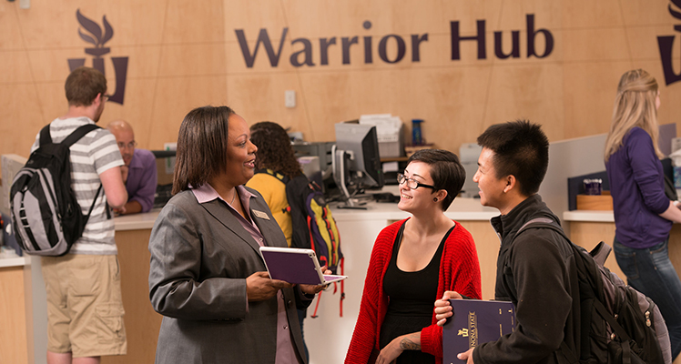 WSU Vice President for Enrollment Management & Student Life with WSU students in the Warrior Hub.