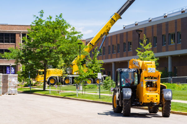 Construction equipment outside Memorial Hall on the WSU campus in Winona.