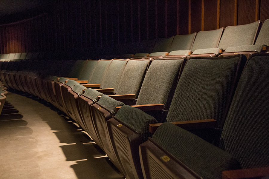 Empty auditorium chairs