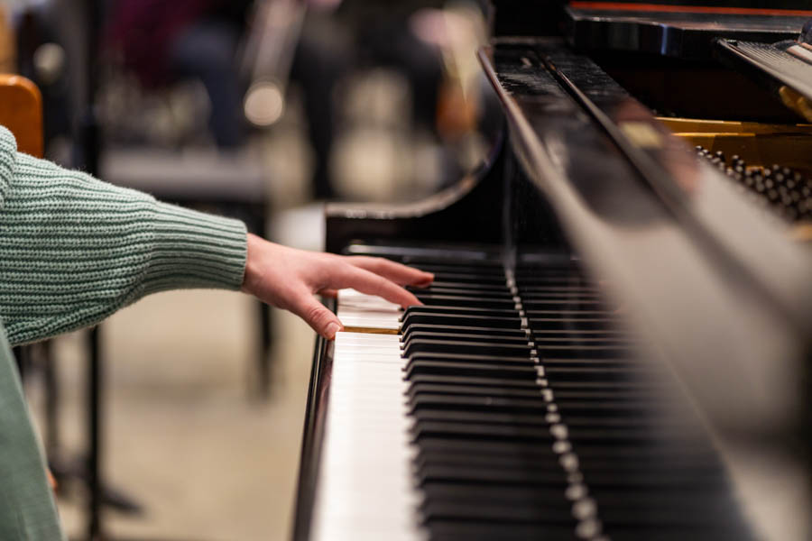 A student plays the piano