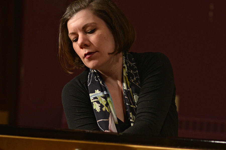 Music faculty Deanne Mohr playing the piano