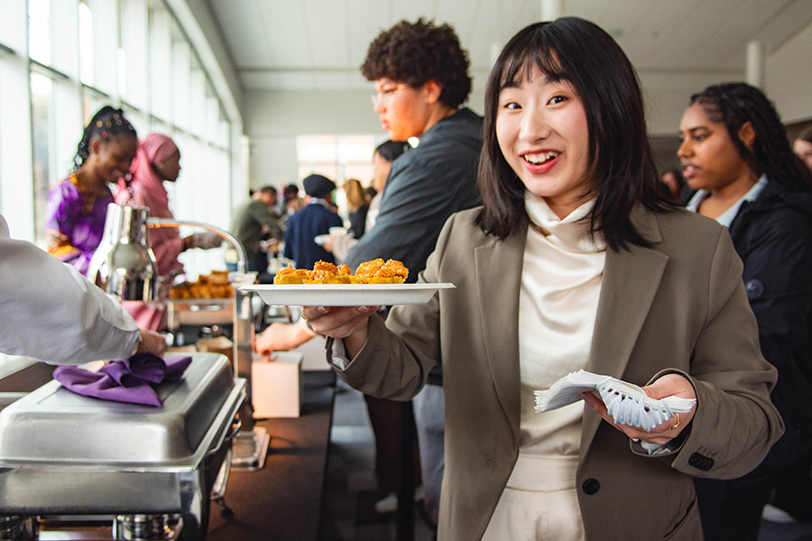 WSU student being served food at an event