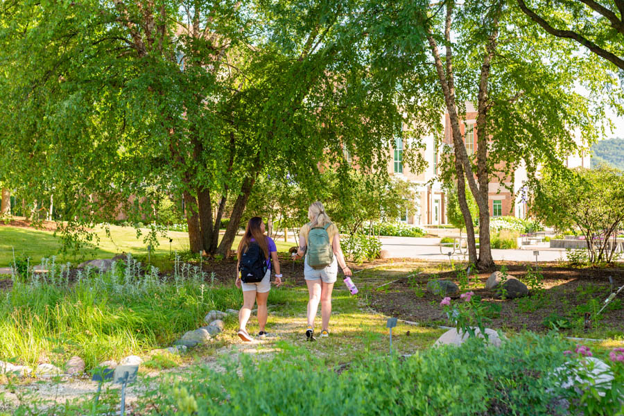 WSU students walking through the campus garden