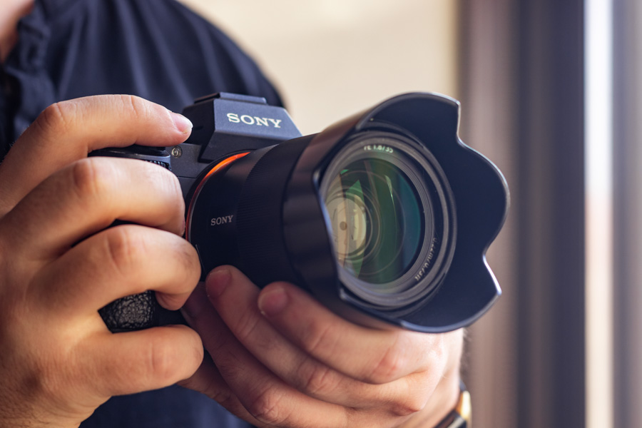 Hands holding a camera