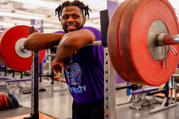 WSU student using weights