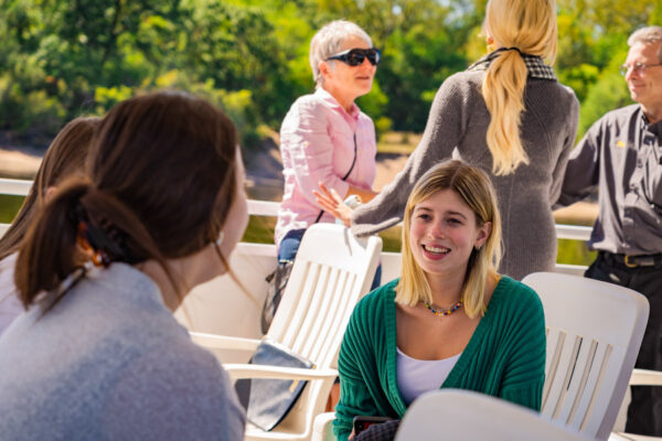 People chat during a campus event.