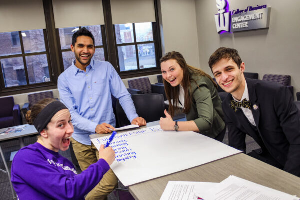 A group of students work on a project in the WSU Engagement Center.