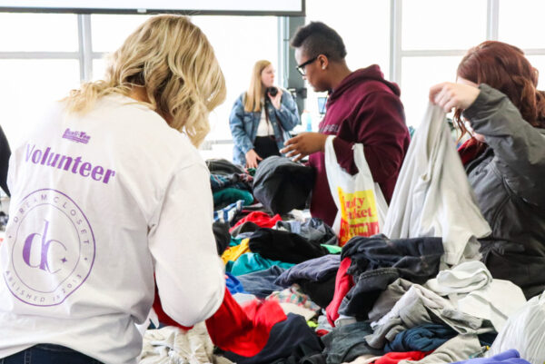WSU students volunteer at a clothing drive event.
