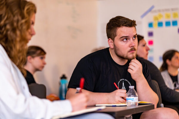 Students take notes during class.