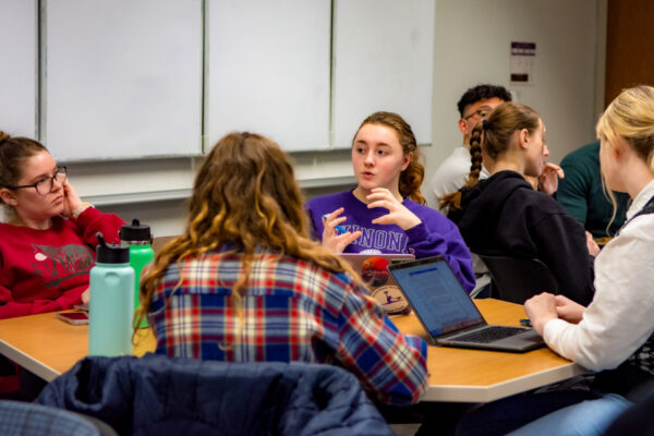 Students discuss topics during class at WSU.