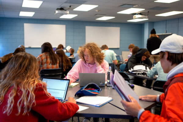 Students work on assignments during class on the WSU campus.