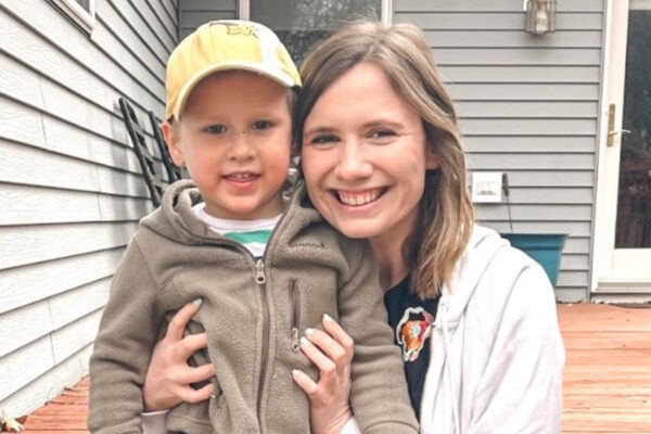 Jessica Houghton '20 with a child.