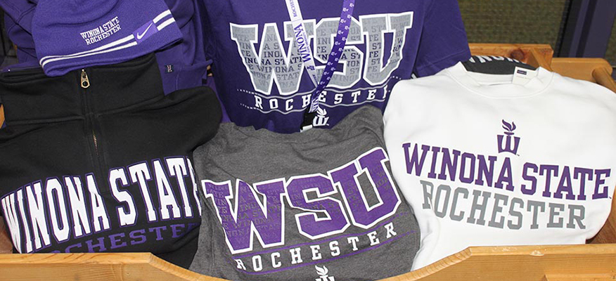 display of t-shirts ad accessories with WSU-Rochester name and logo