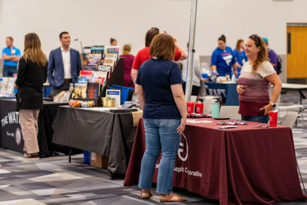 Students browse employer booths at the WSU Career Fair.
