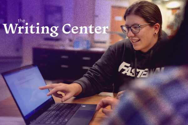 A graphic for the Writing Center with a photo of students working on a laptop.