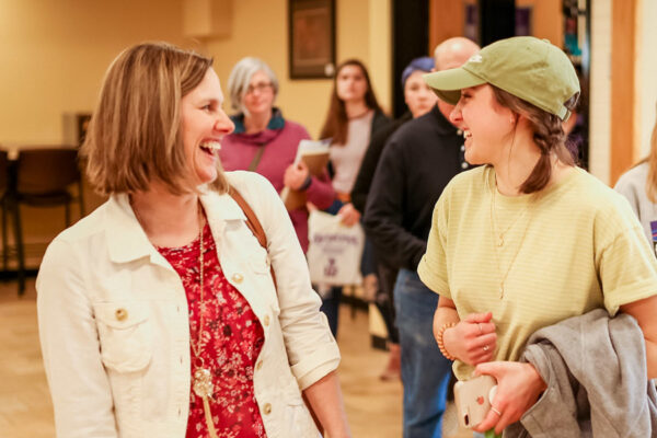 A student and her mom laugh during a tour of the WSU campus.