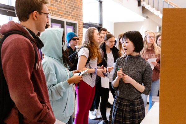 Students gather for a presentation on WSU campus.