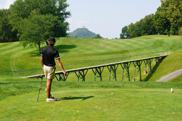 A WSU athlete golfs at a local golf course in Winona.