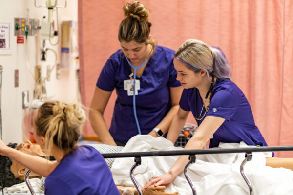 Nursing students practice their skills in the simulation lab on WSU campus.