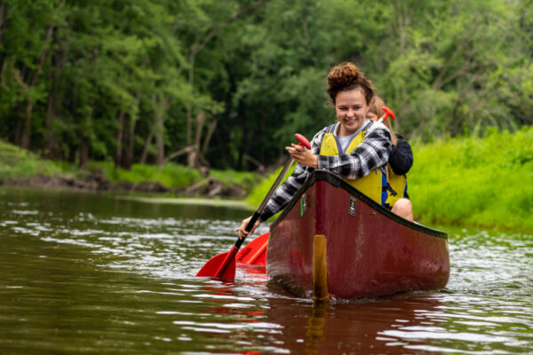 Students canoe on the backwaters of the Mississippi River.