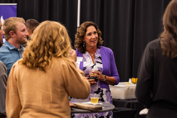 People mingle at an event on the WSU campus.