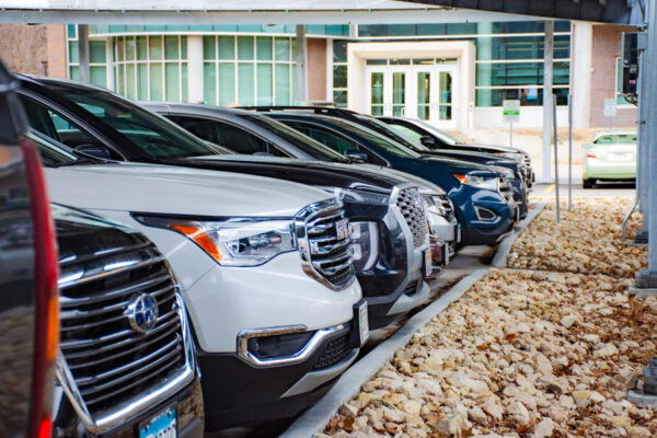 A row of cars in a parking lot on the WSU campus in Winona.