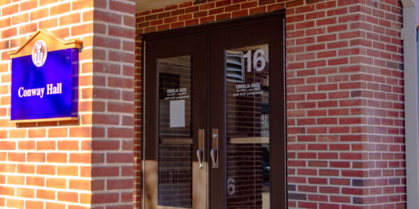 An exterior view of a doorway into Conway Hall on the WSU campus.