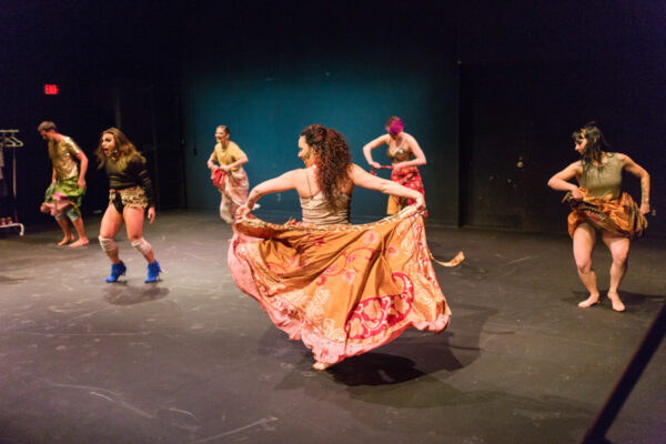 Students perform in a dance production in the Black Box Theatre in the PAC.