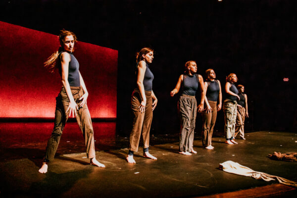 Students perform in a dance production on the main stage in the PAC.