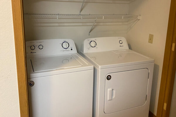 The private laundry area in an apartment unit in East Lake Apartments.
