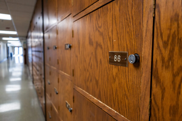 A wall of wooden lockers for instrument storage in the PAC.