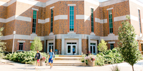 Students exit the Krueger Library on the WSU campus in Winona.