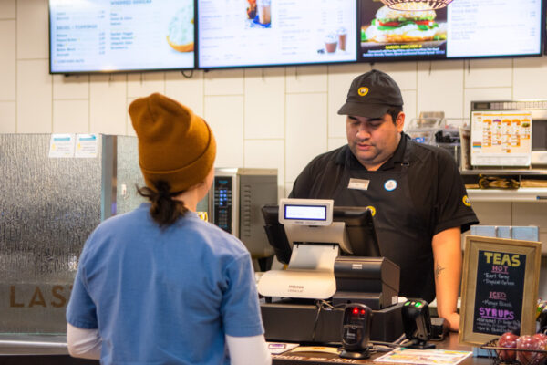 A student orders a drink at the cafe located in the Krueger Library on the WSU campus.