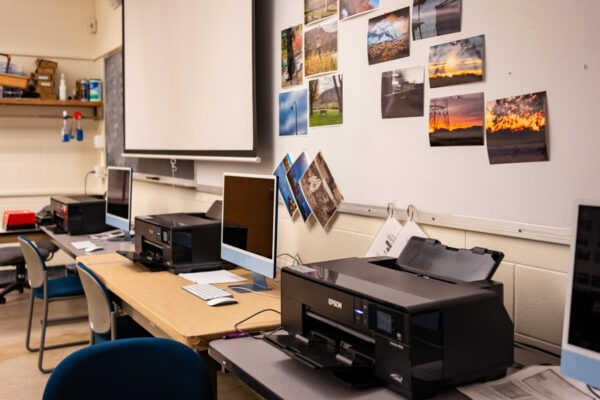 The Photography Studio provides computers and printers for students to use.