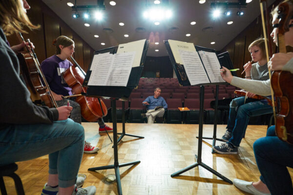 Students perform in a musical ensemble in the recital hall in the PAC.