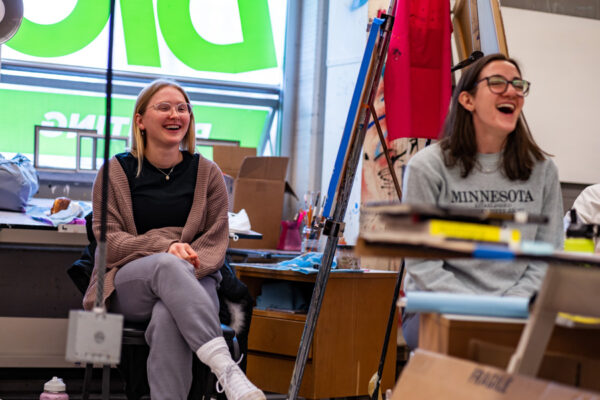 Students laugh during class in the art studio on the WSU campus.
