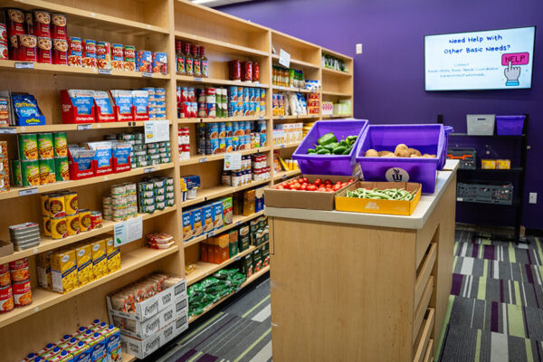 The Warrior Cupboard stocked with produce, canned goods and personal hygiene items